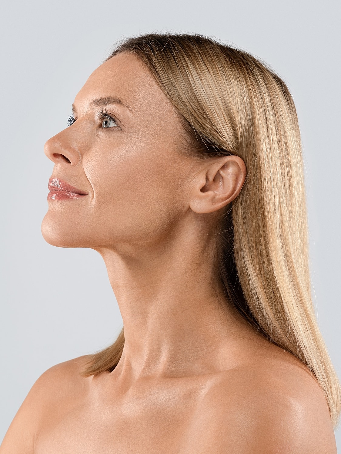 Comparison of skin textures and tones on face.