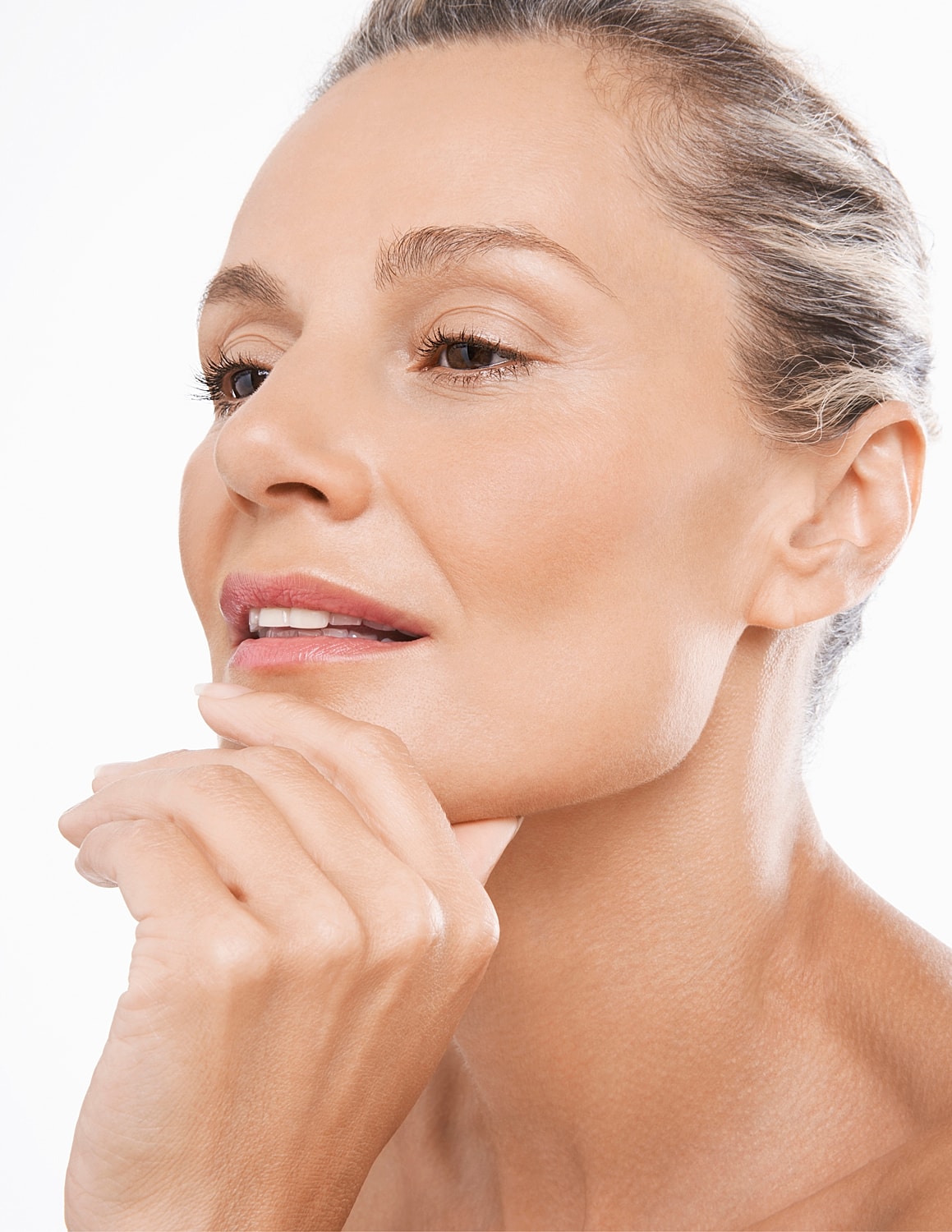 Woman with closed eyes and soft expression.