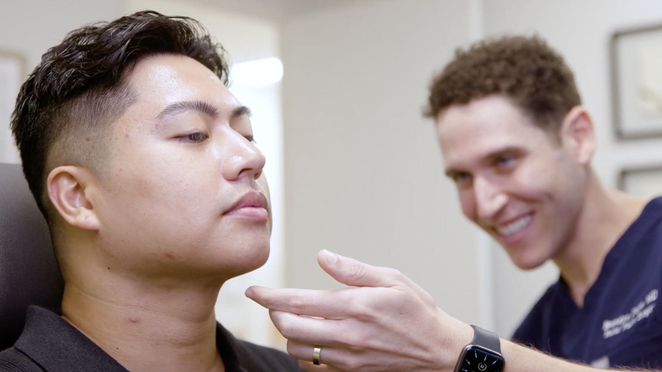 Consultation for facial treatment in a clinic.