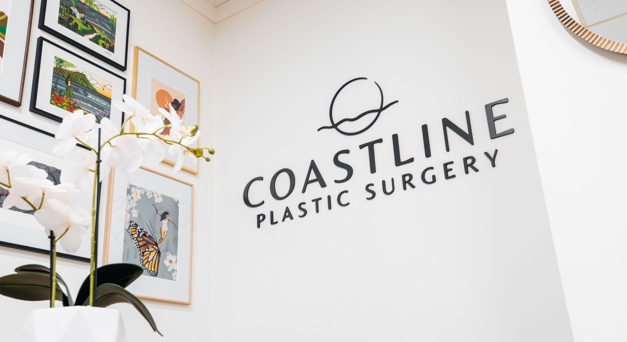 Coastline Plastic Surgery office interior with artwork.